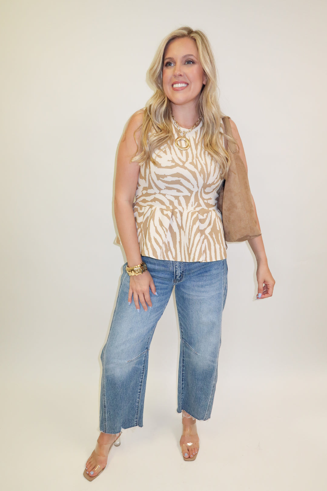 Untamed Feel Zebra Sleeveless Peplum Top