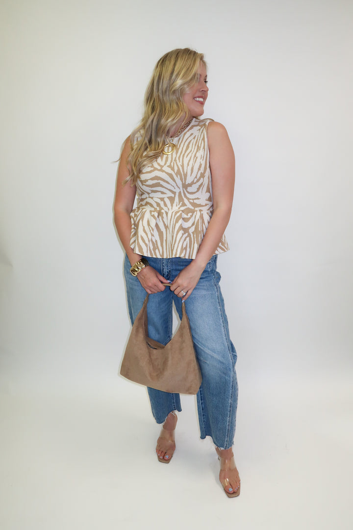 Untamed Feel Zebra Sleeveless Peplum Top
