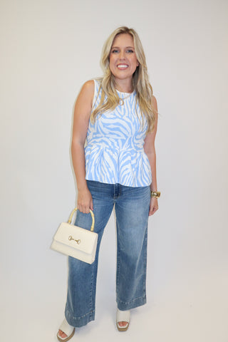 Untamed Feel Zebra Sleeveless Peplum Top - The Pink Tulip Clothing