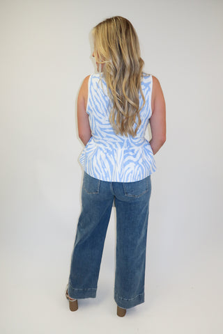 Untamed Feel Zebra Sleeveless Peplum Top - The Pink Tulip Clothing