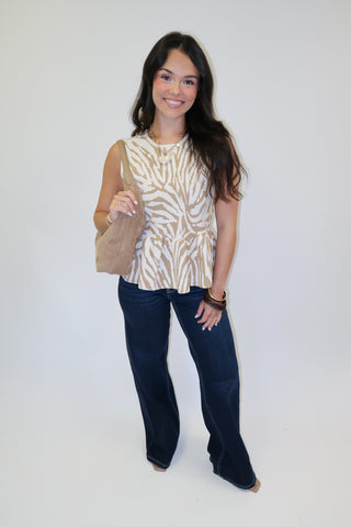 Untamed Feel Zebra Sleeveless Peplum Top - The Pink Tulip Clothing
