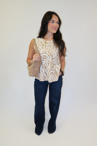 Untamed Feel Zebra Sleeveless Peplum Top - The Pink Tulip Clothing