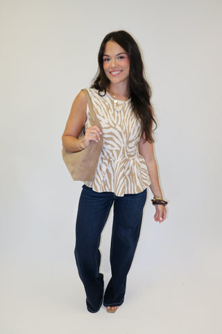 Untamed Feel Zebra Sleeveless Peplum Top - The Pink Tulip Clothing