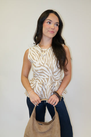 Untamed Feel Zebra Sleeveless Peplum Top - The Pink Tulip Clothing