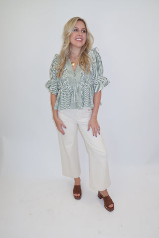 Making Waves Stripe Peplum Top