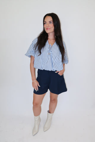 Worth Noting Plaid Tie Neck Top