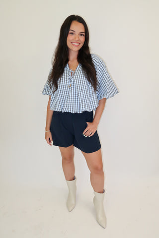 Worth Noting Plaid Tie Neck Top