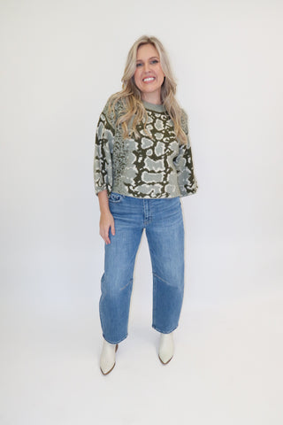 Snake Eyes Mock Neck Sweater
