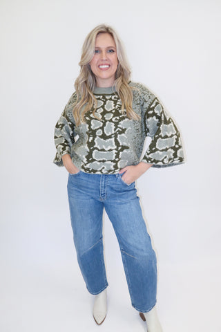 Snake Eyes Mock Neck Sweater