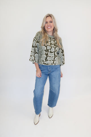 Snake Eyes Mock Neck Sweater