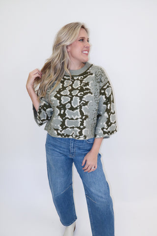 Snake Eyes Mock Neck Sweater