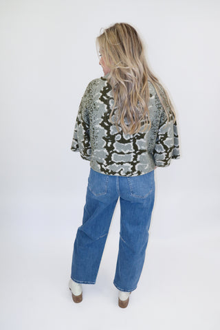 Snake Eyes Mock Neck Sweater