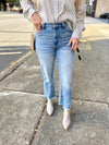 High Rise Uneven Hem Jean