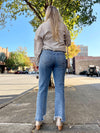 High Rise Uneven Hem Jean