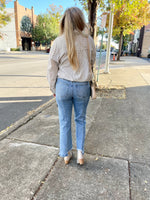 High Rise Uneven Hem Jean